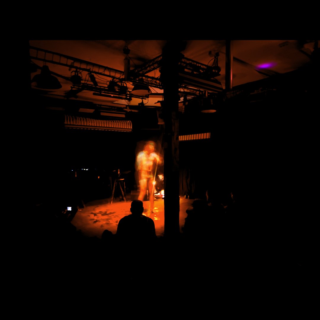 Akad⁰ performing Momentum under warm stage lighting at Kultur Lounge, Leipzig · 14