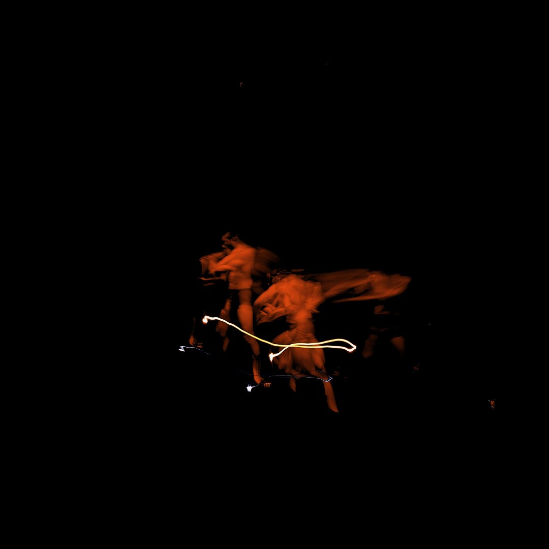 Akad⁰ performing Momentum under warm stage lighting at Kultur Lounge, Leipzig · 16