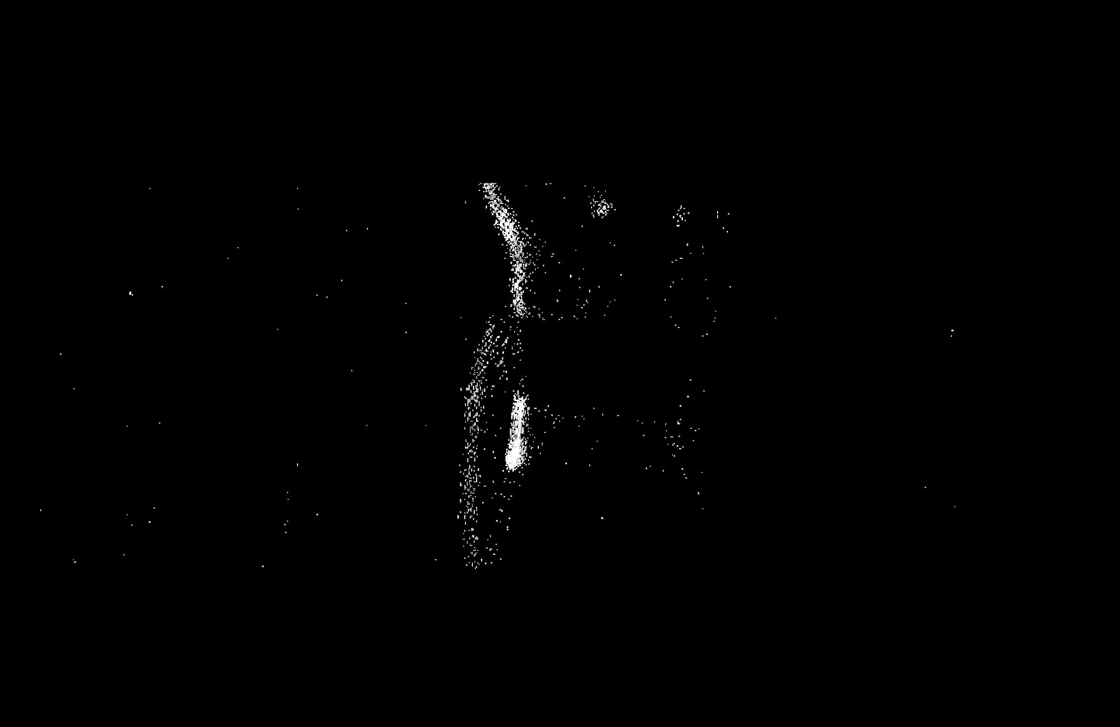 A dancer traced in light against darkness